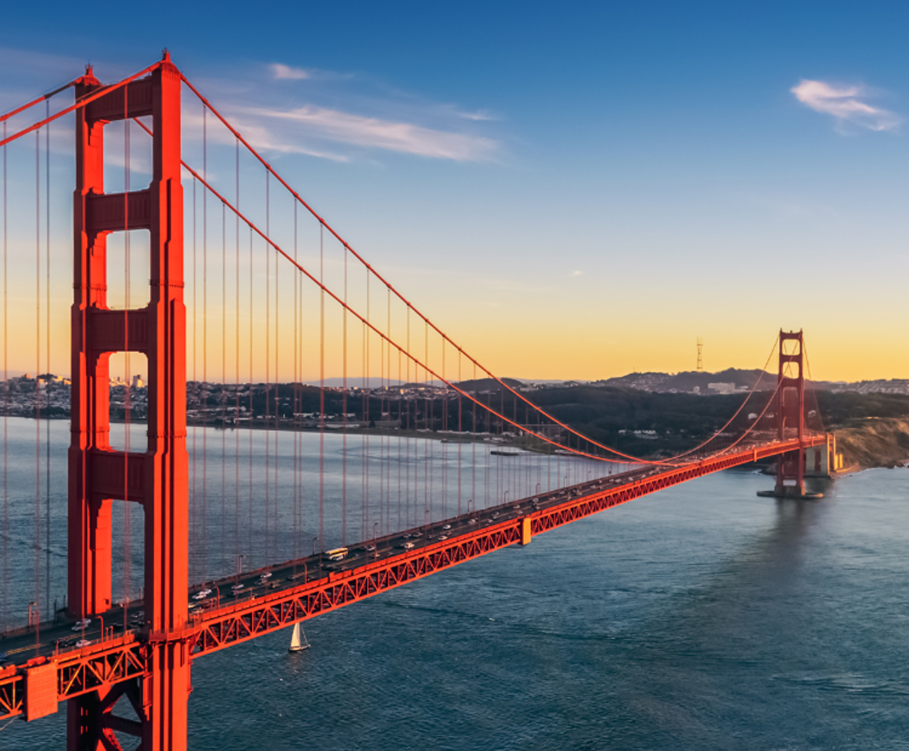 Golden Gate Bridge in front of surrounding landscape 