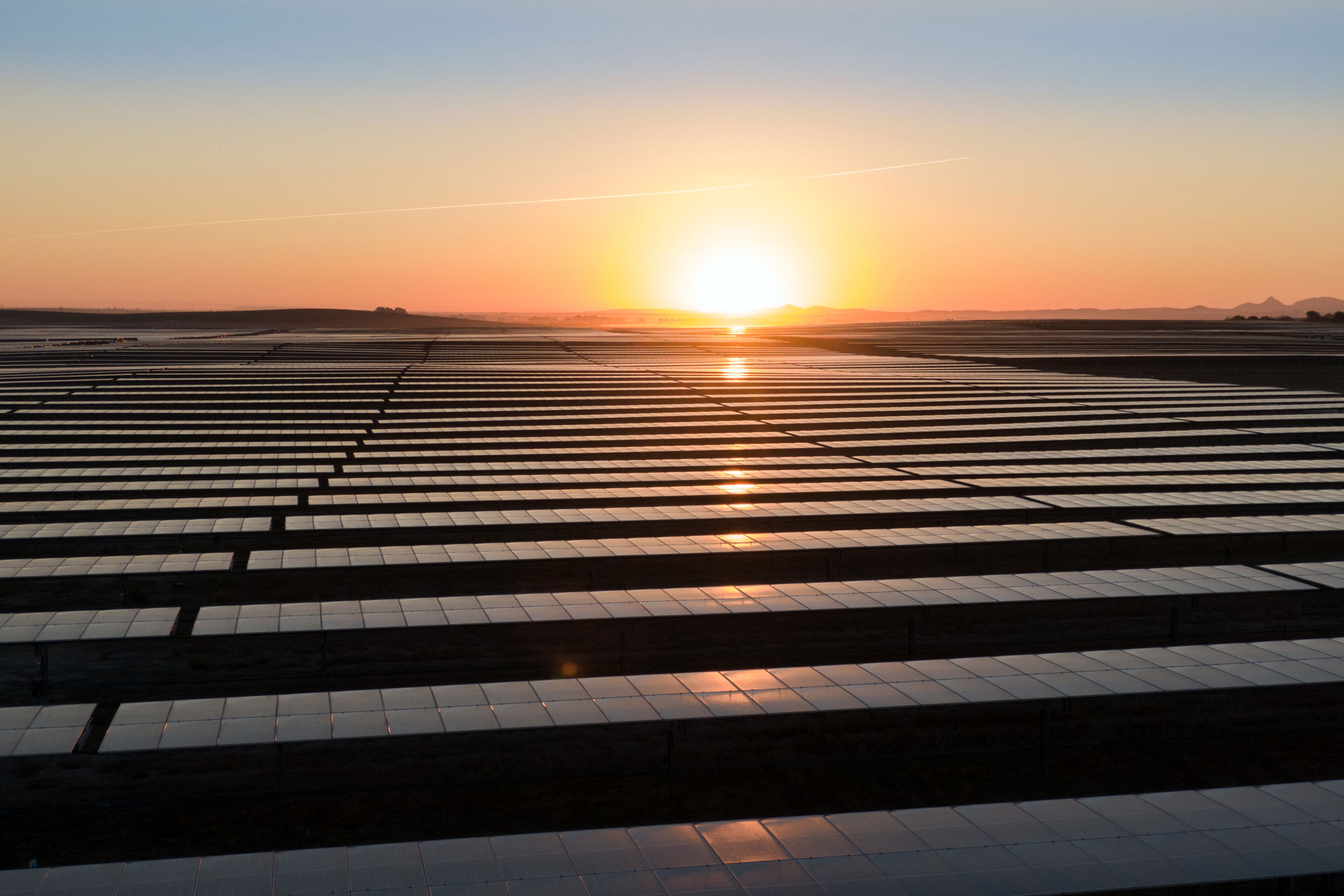 Sunset over solar plant