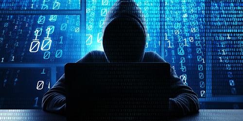 Computer hacker with hoodie