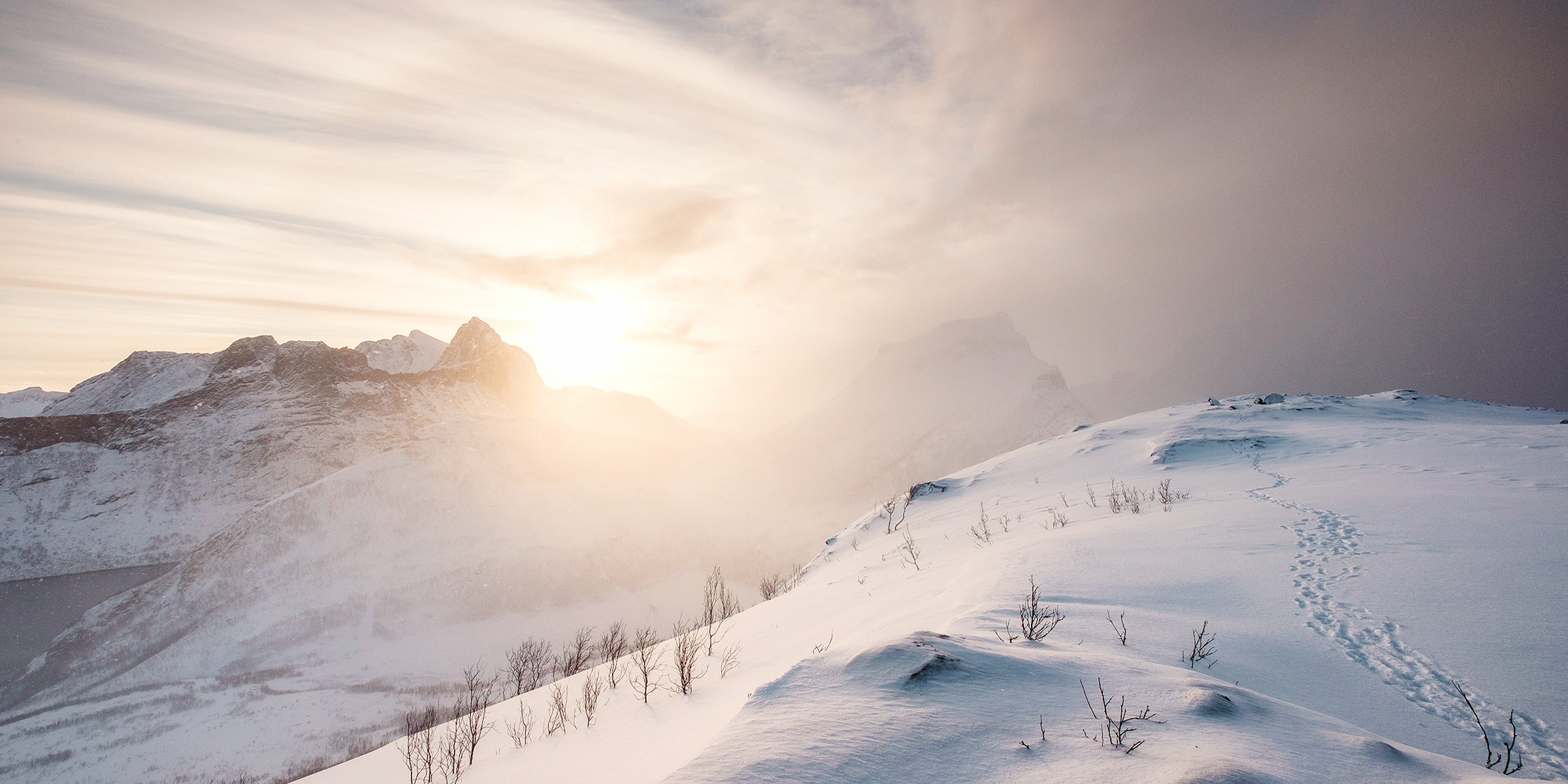 Sun over winter landscape