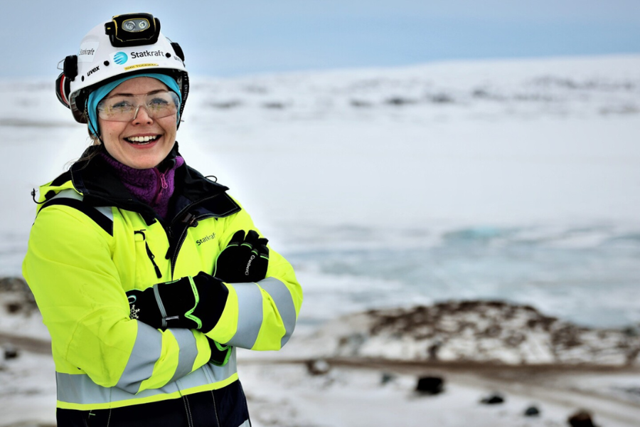 Woman wearing safety gear and smiling