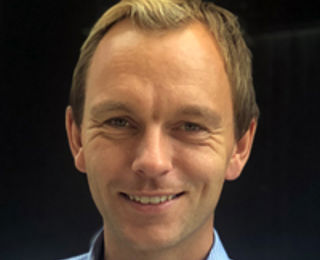 Image of Aslak Mæland smiling