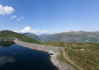 Grimsåsen dam and reservoir in Høyanger, surrounded by mountainous terrain in western Norway.