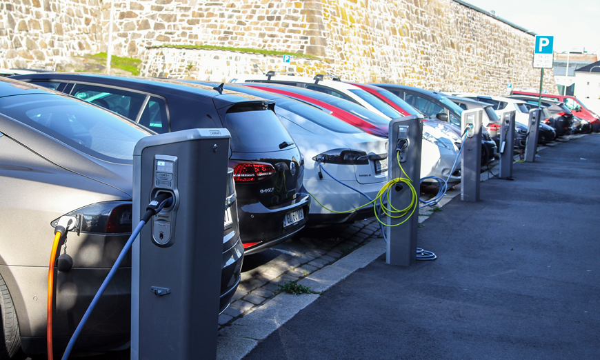 Electric cars at charging stations